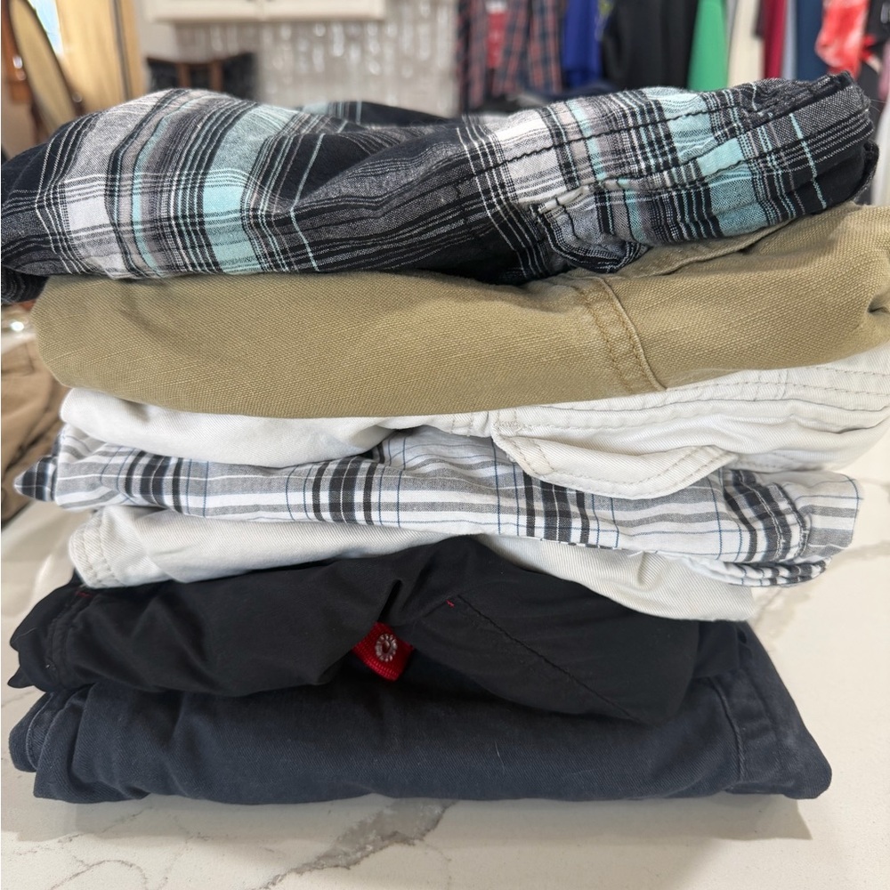 Stack of Men's Casual shorts and Shirts - Black, White, Khaki, Teal Plaid 7 pair